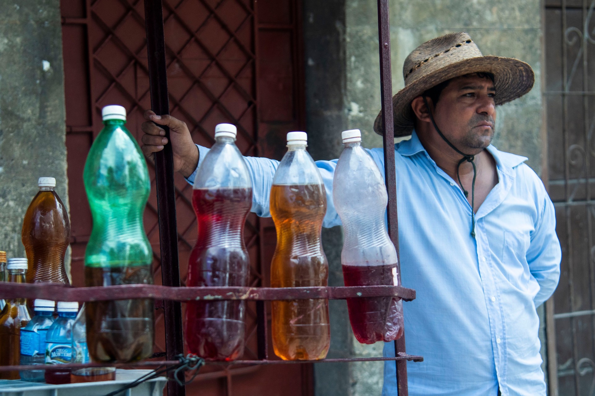 Cuban man selling sweet drinks on a street in Havana, Cuba